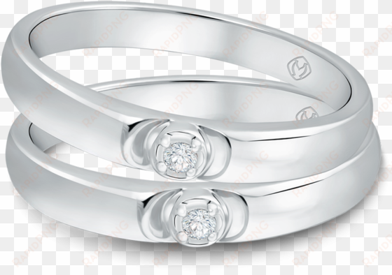 a pair of wedding rings with @0 - engagement ring
